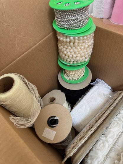Box of trims, lace, pearls & tulle.
