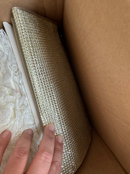 Box of trims, lace, pearls & tulle.