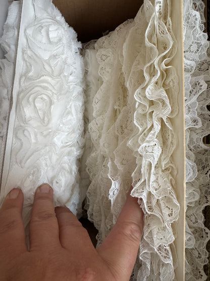 Box of trims, lace, pearls & tulle.